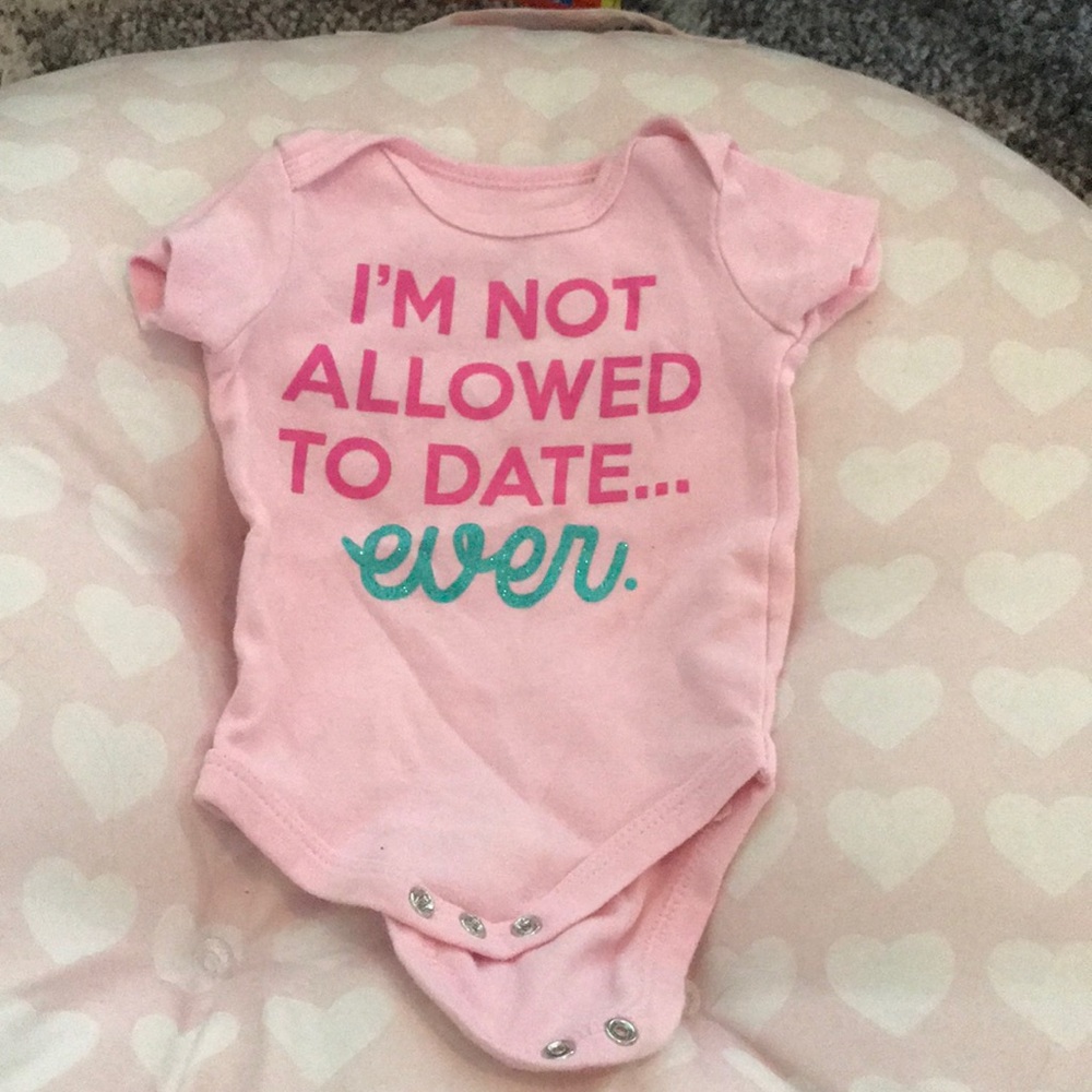 Adorable pink onesie.